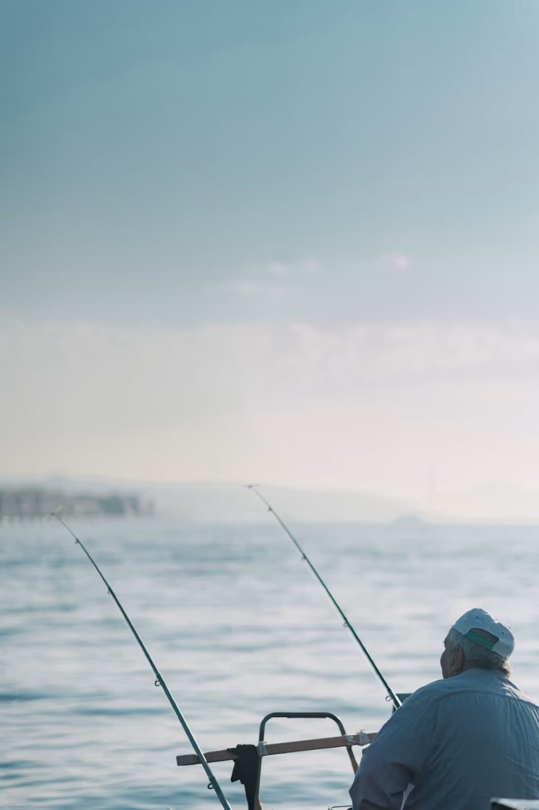 Retiree fishing by the water as a symbol of sustainable retirement income.