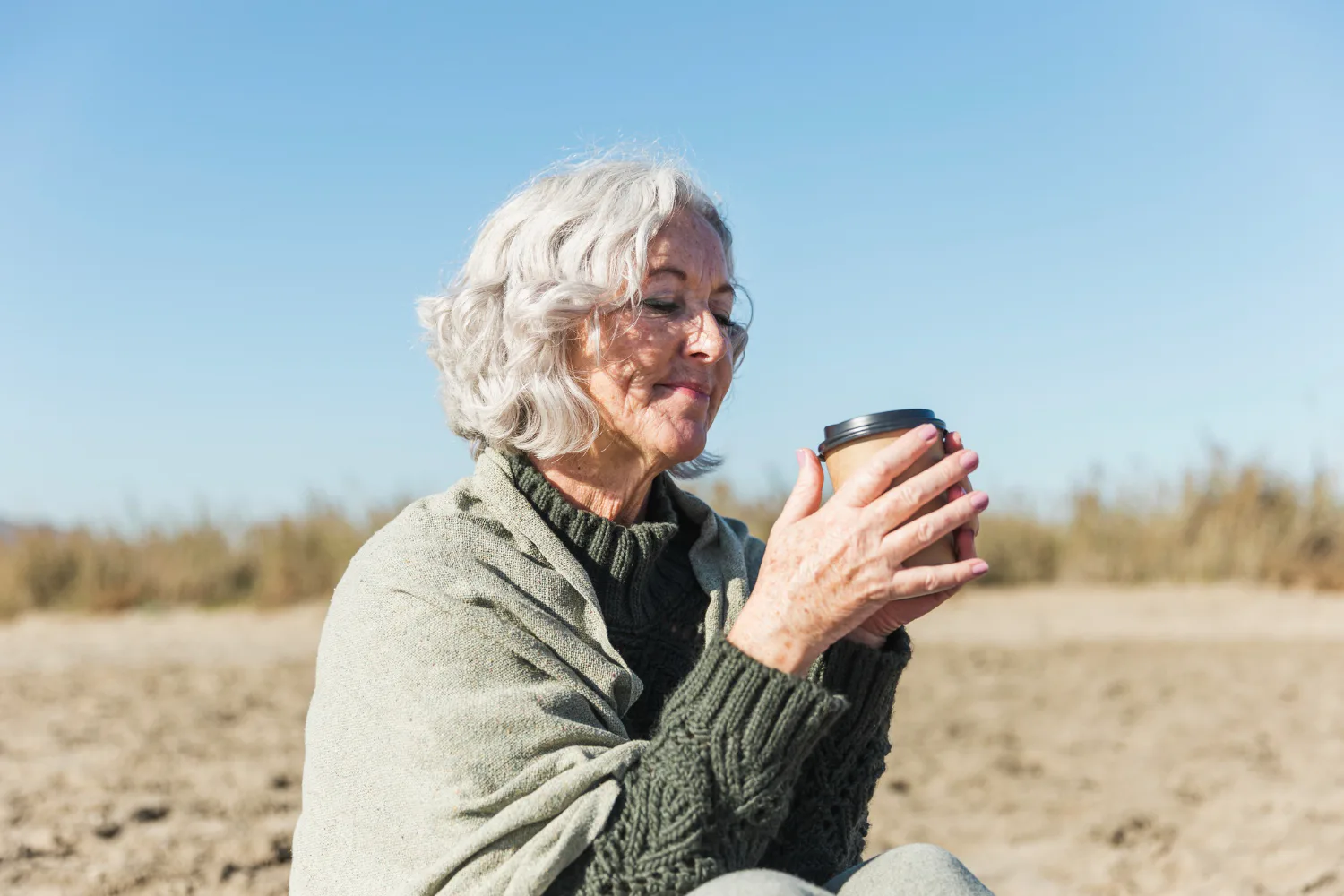 Retired woman considering how income sources may affect taxes on Social Security benefits.