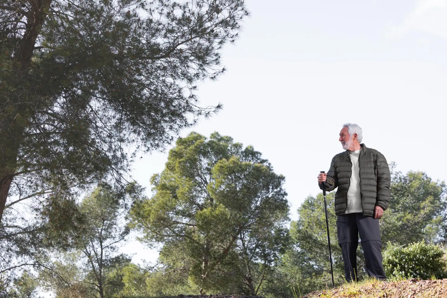 Older retiree outdoors while planning for inflation and long-term purchasing power.